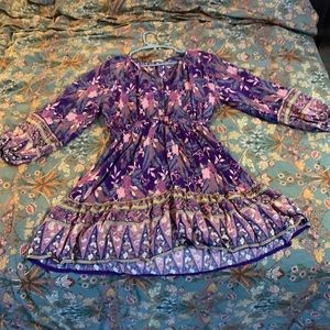 Purple dress cinched at waist